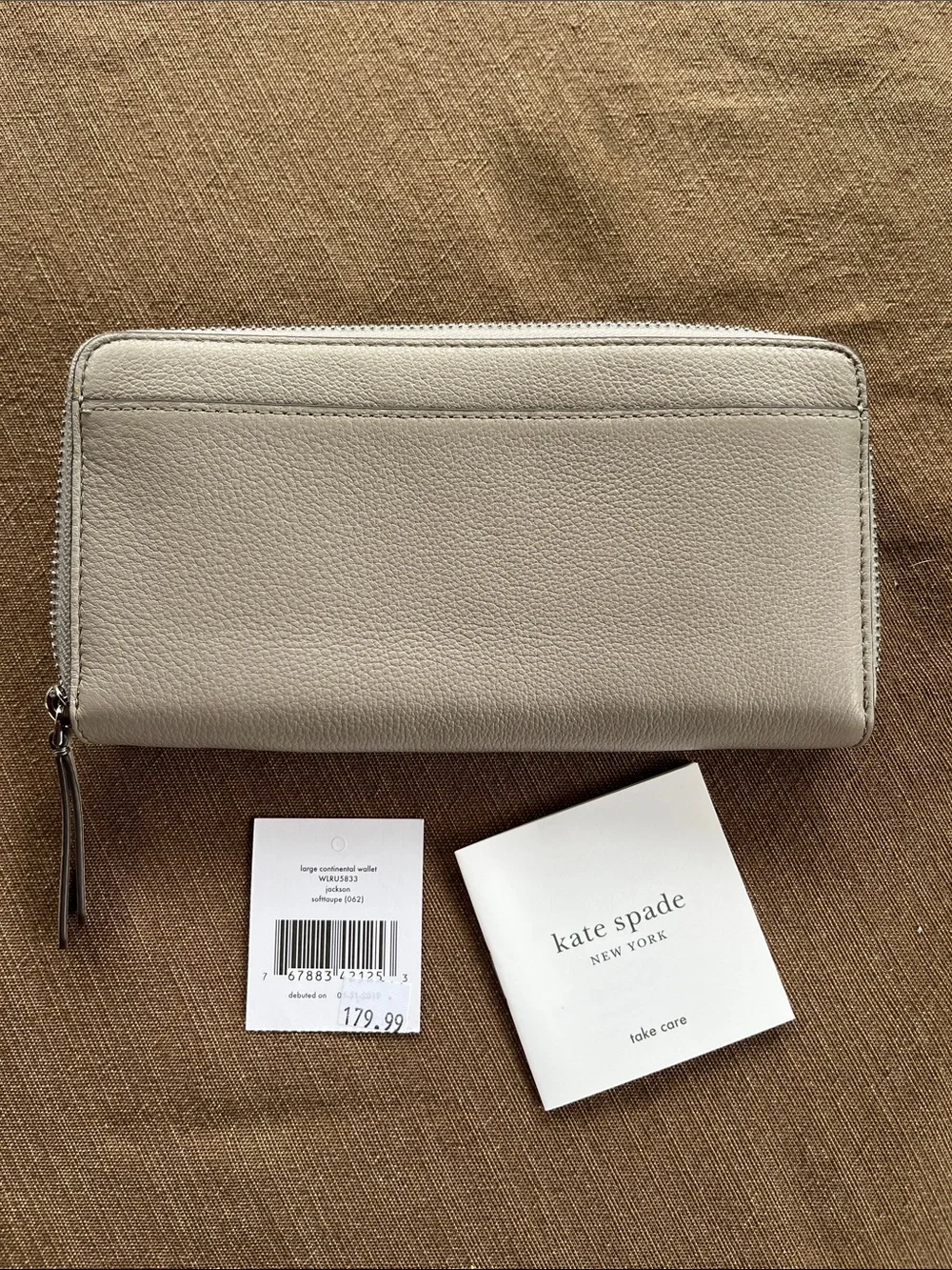 kate spade White Pebbled Leather Zip Wallet